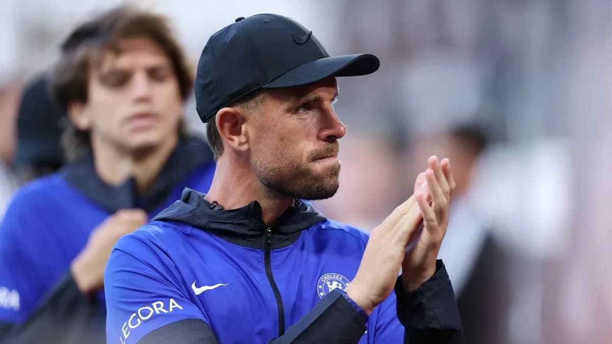 Coach applauding during match on sidelines