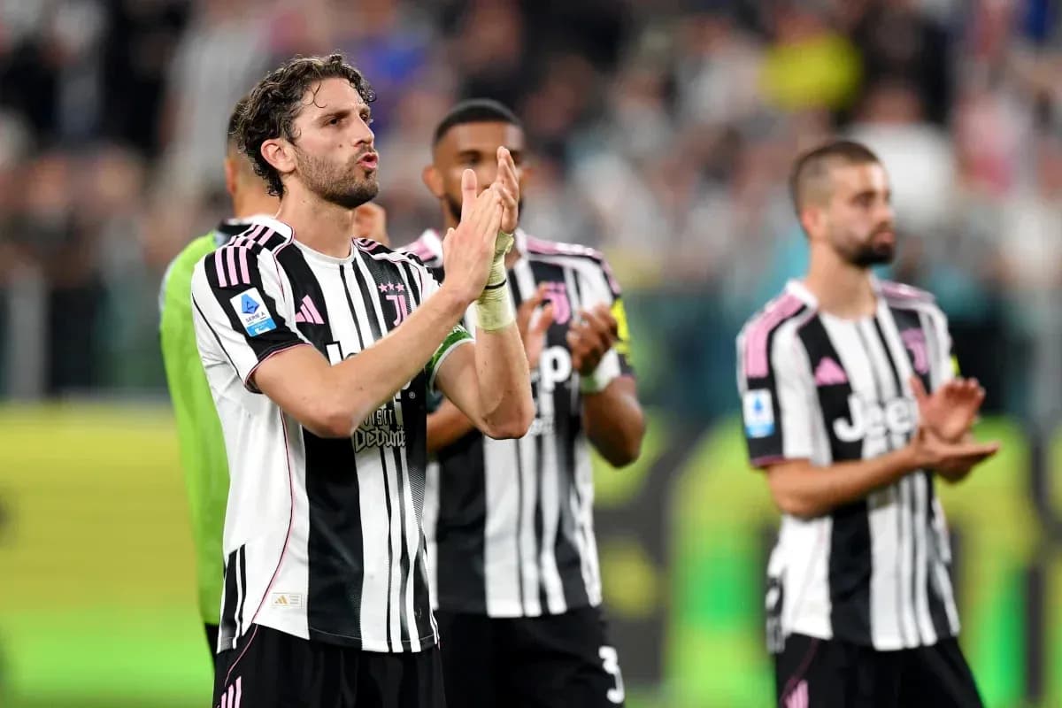 Juventus players applauding fans after the match