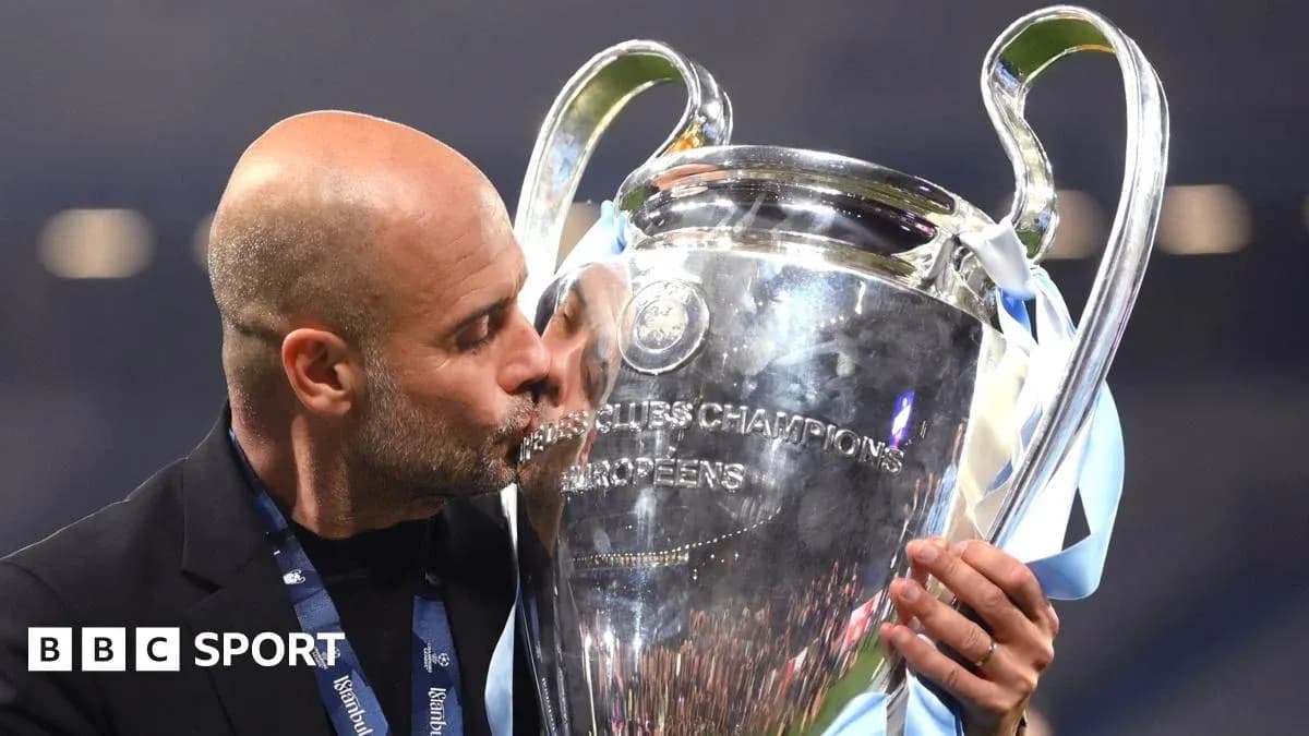 Coach kissing UEFA Champions League trophy