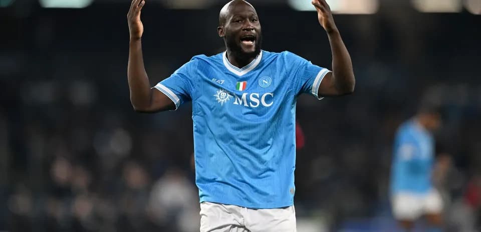 Player celebrating in Napoli's blue jersey during match
