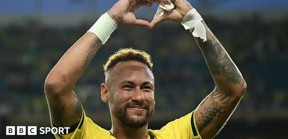 Neymar celebrating with a heart gesture after match