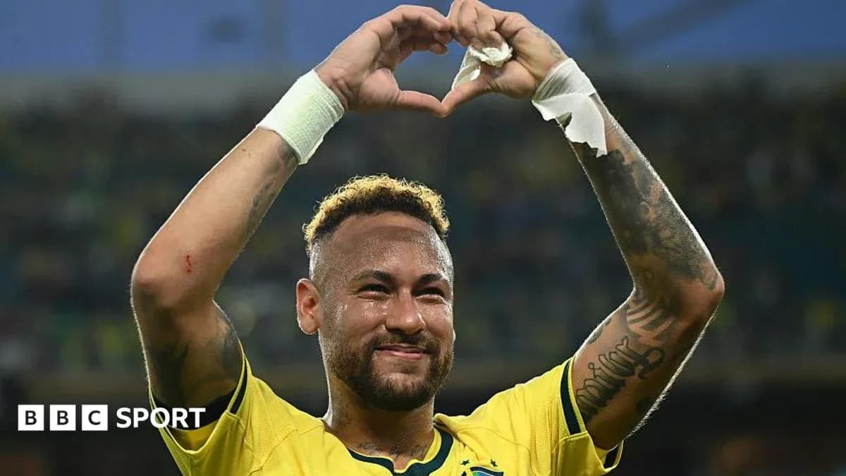 Neymar celebrating with a heart gesture after match
