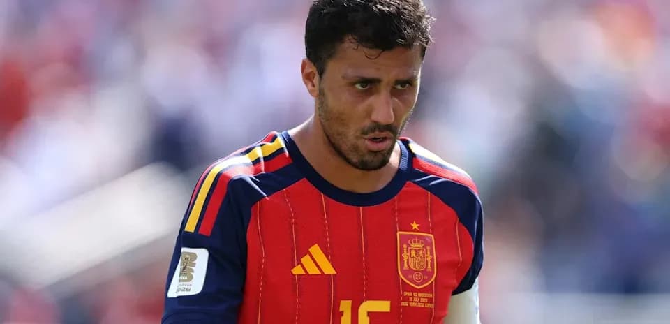 Spain player walking on field during match