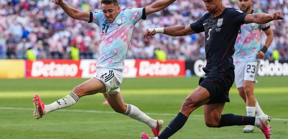 Player kicking ball during USA vs Belgium match
