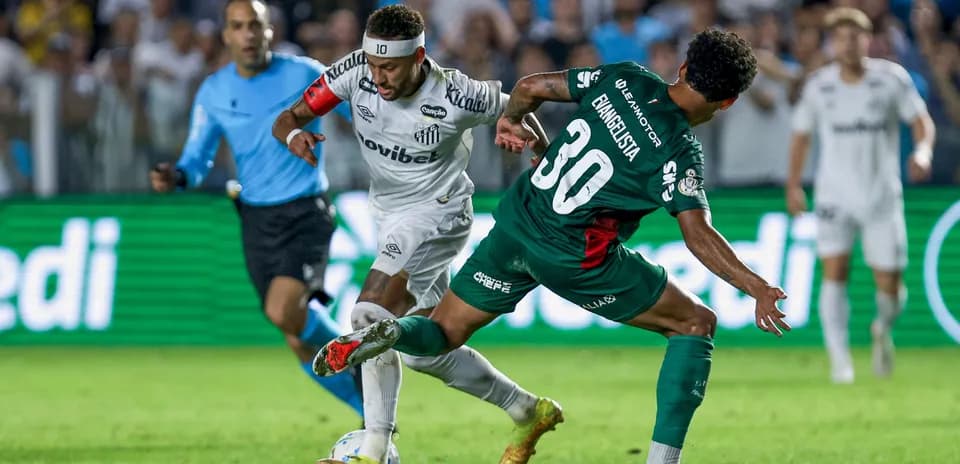 Player dribbling past opponent during football match
