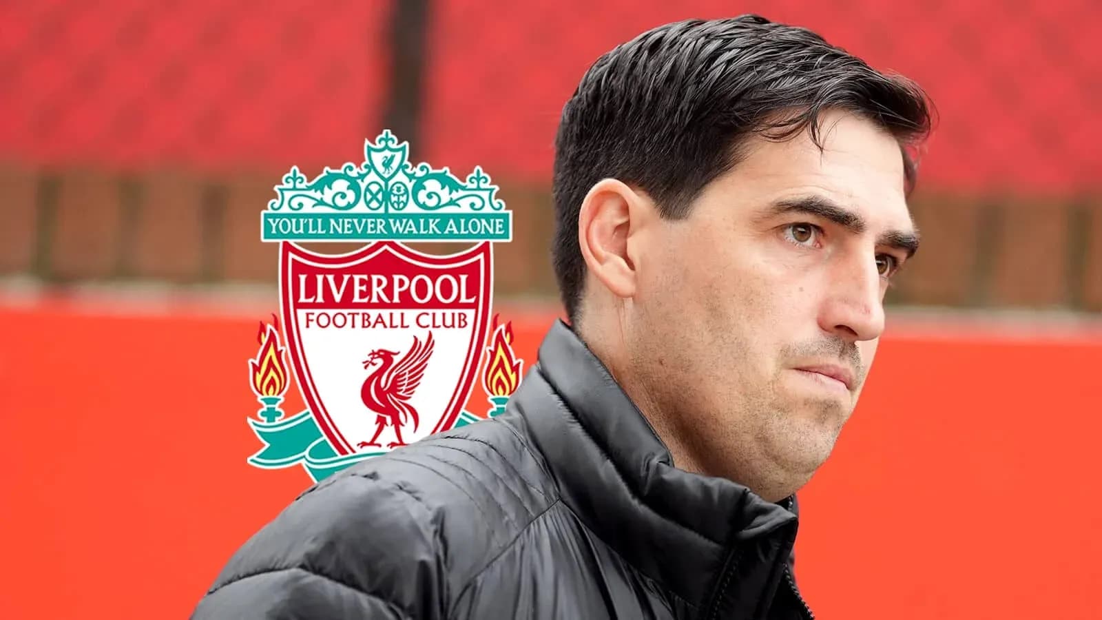 Coach standing in front of Liverpool FC logo