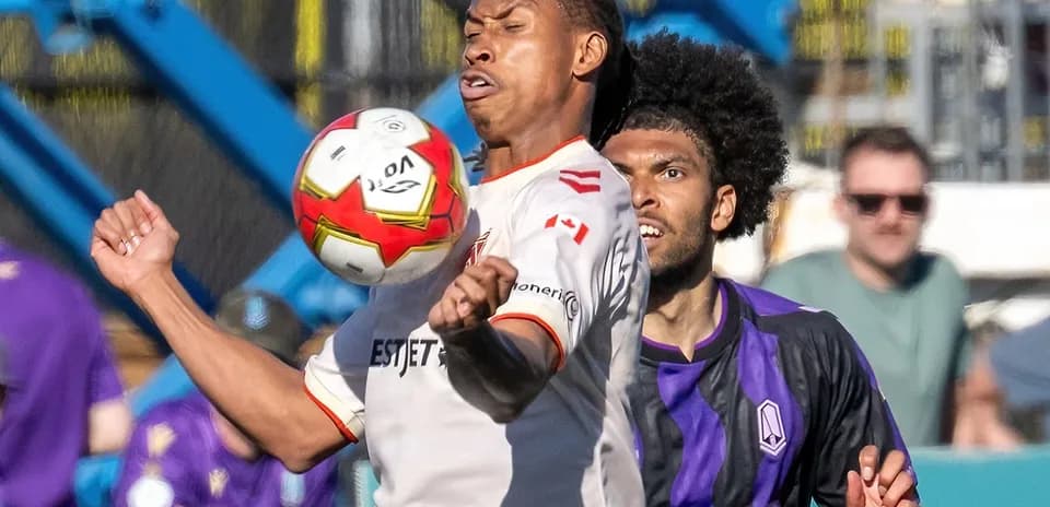 Player controlling the ball during Cavalry FC match