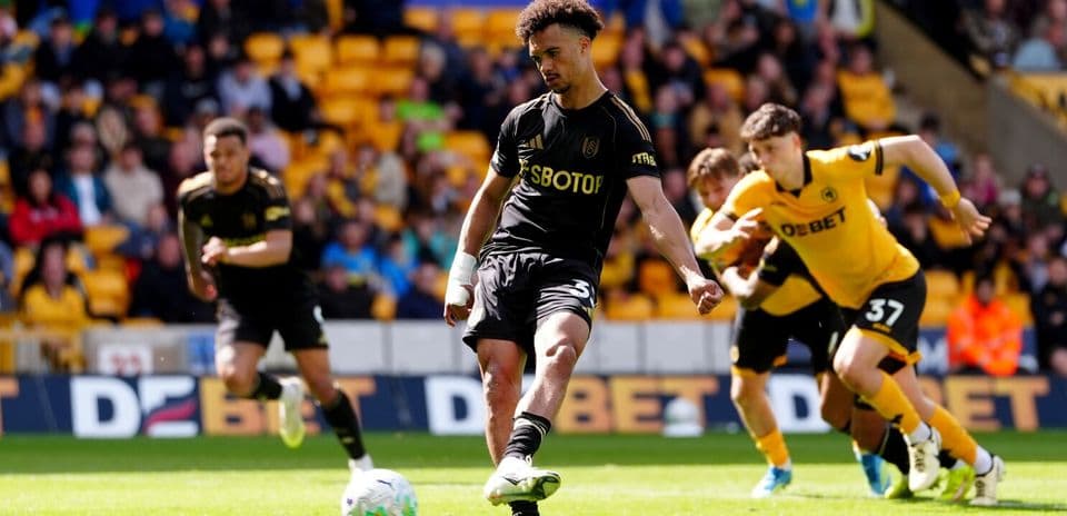 Wolves player taking a penalty kick