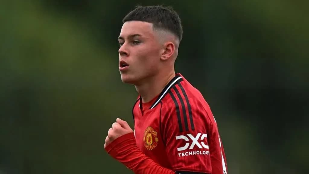 Young player in red jersey during training session
