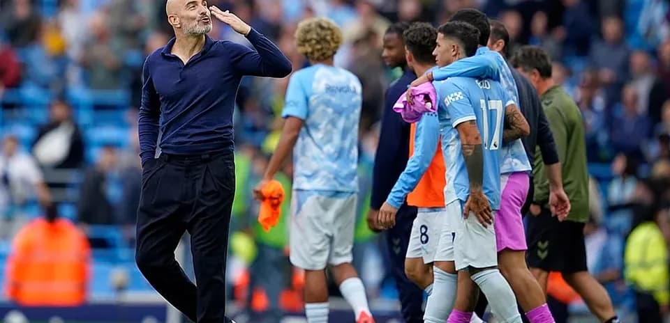 Manchester City players celebrating after the match