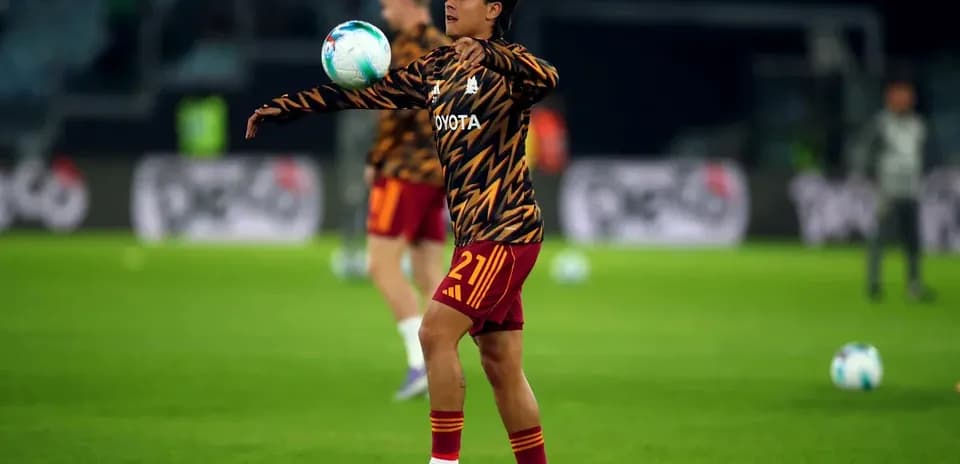 Player warming up and juggling a soccer ball
