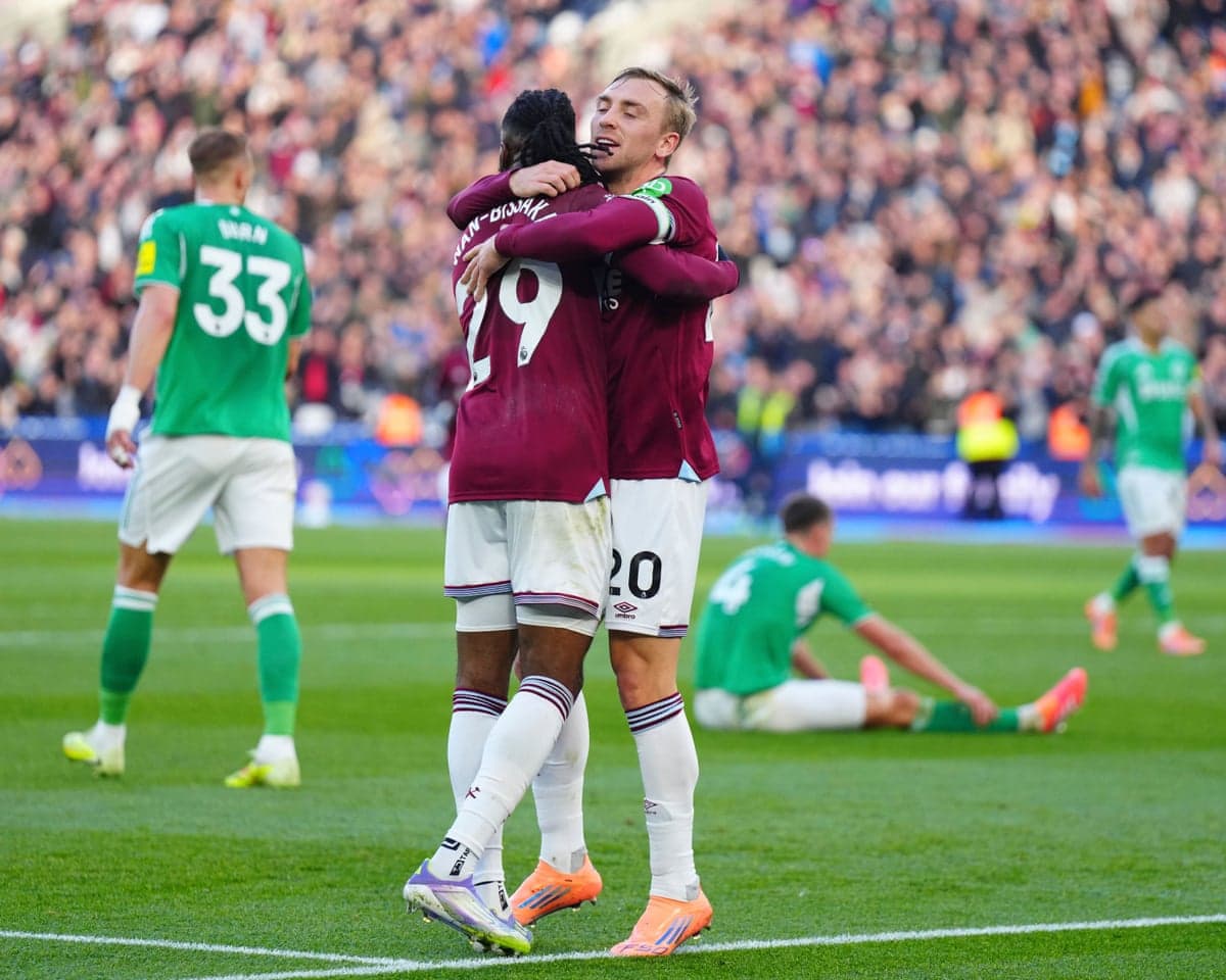 Players celebrating a goal during match