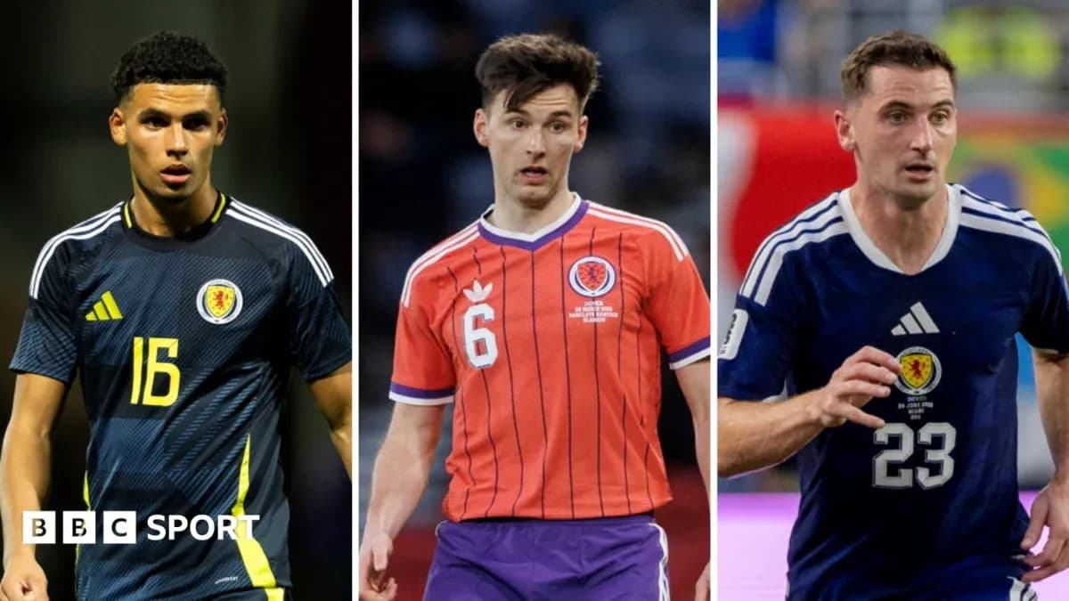 Three Scottish football players in team jerseys