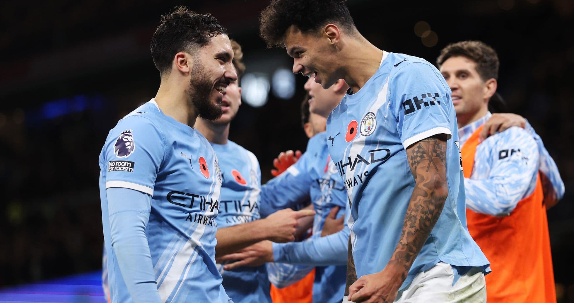 Manchester City players celebrating a goal