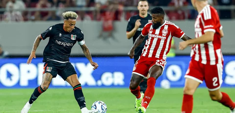 Players competing in NEC Nijmegen vs Olympiakos match