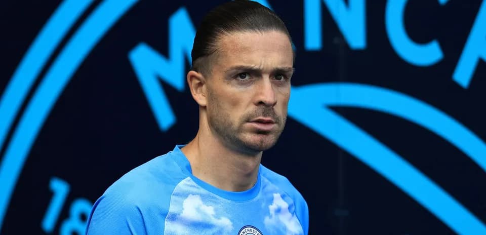 Player in Manchester City training kit at stadium