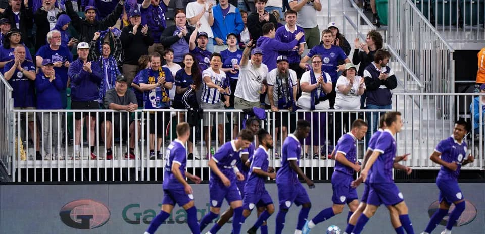 Louisville City fans celebrating during match