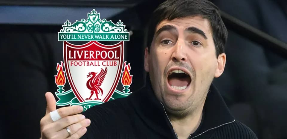 Coach gesturing passionately with Liverpool logo in background