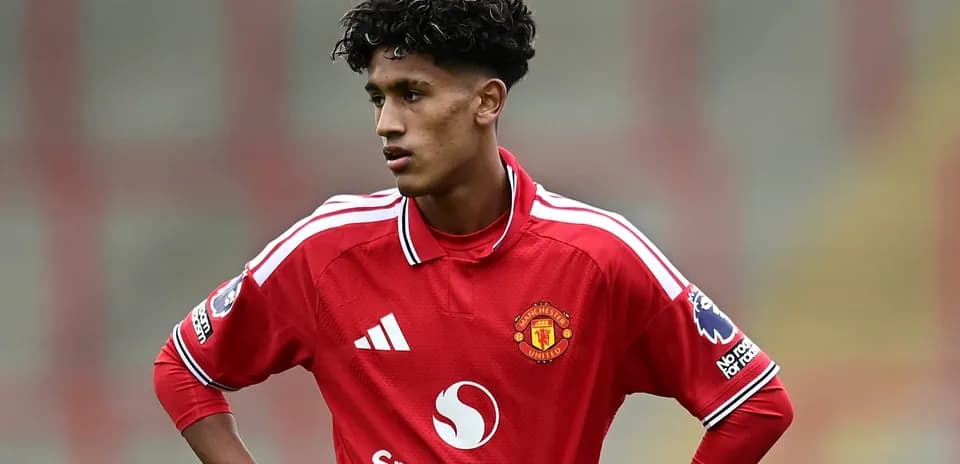 Player wearing Manchester United jersey on the field