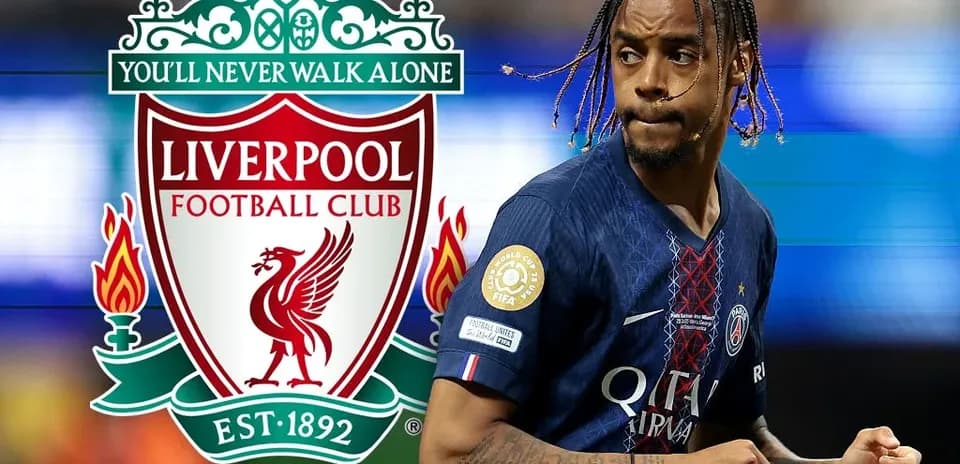 Player in PSG kit with Liverpool logo background