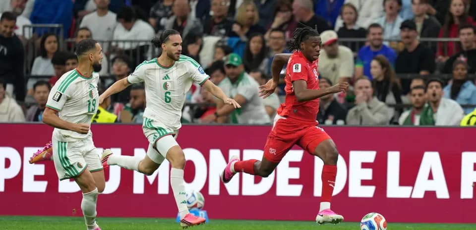 Player running with the ball during Switzerland vs Algeria