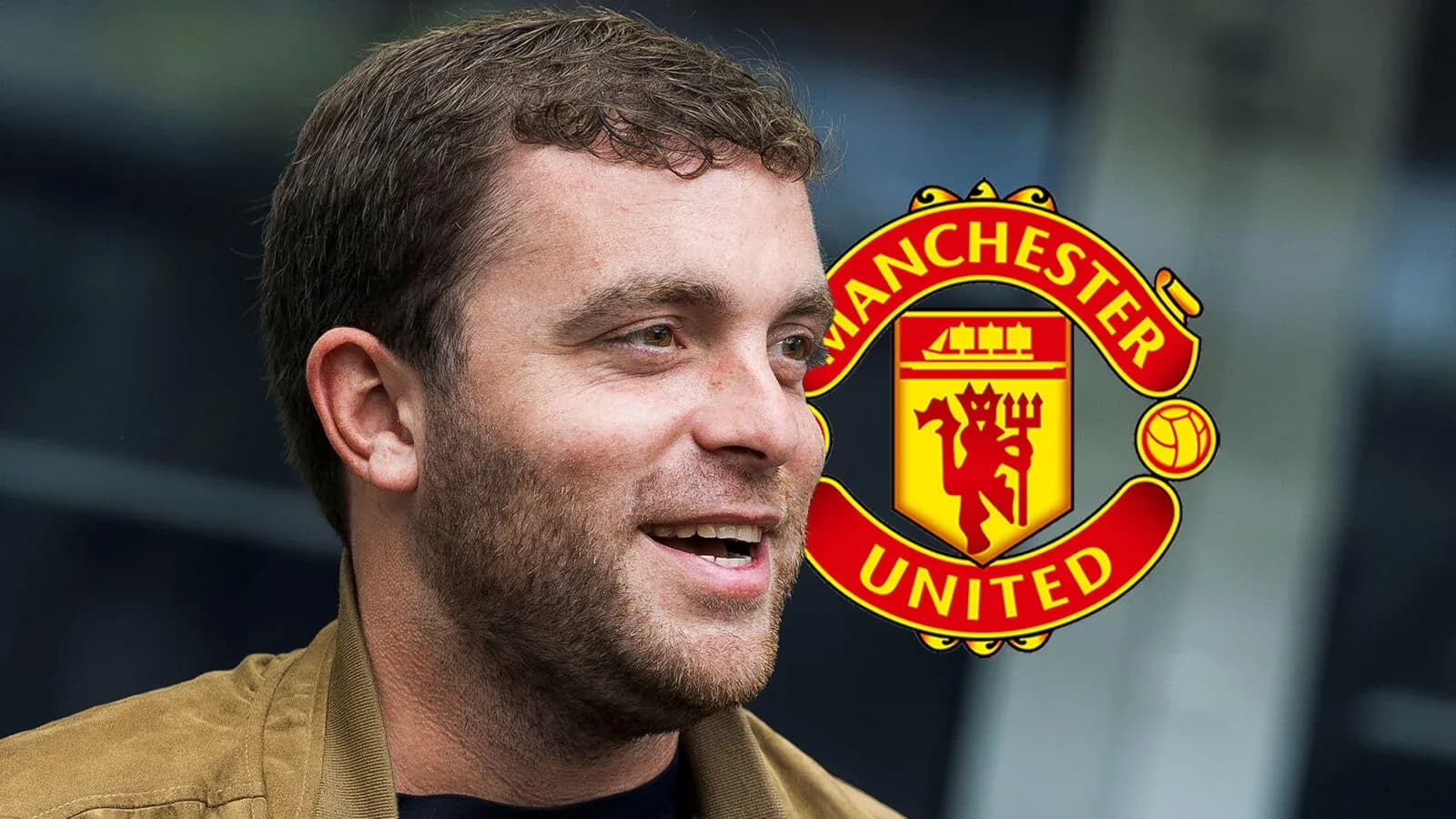 Man speaking with Manchester United logo in background