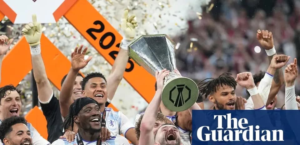 Team celebrating with trophy after winning championship