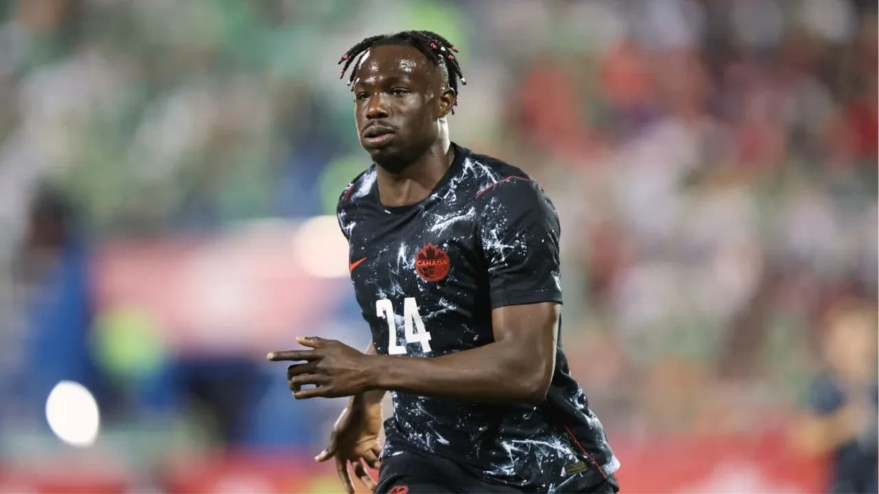 Player in Canada jersey running on the field