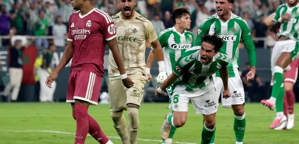 Real Betis players celebrate a goal against Real Madrid