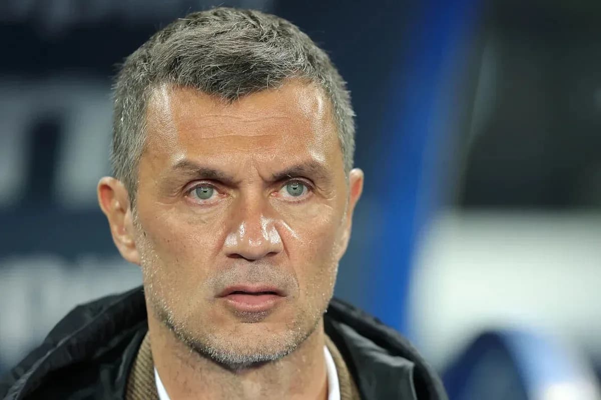 Coach looking on during a match in stadium