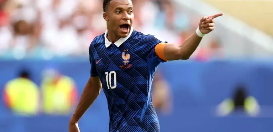 Player celebrating and directing teammates on field