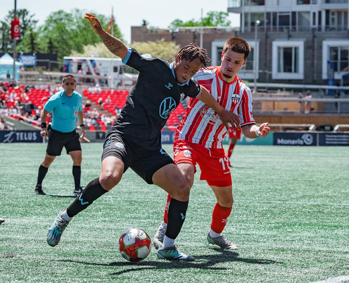 Player competing for the ball during match