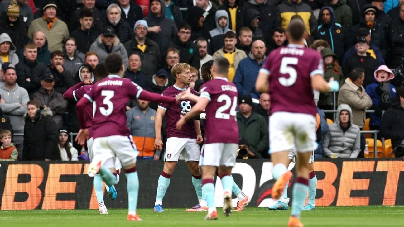 Burnley players celebrating during Premier League match