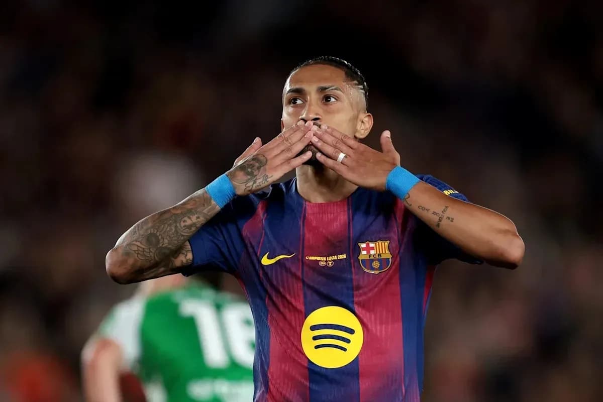 Player celebrating with hand gestures on field