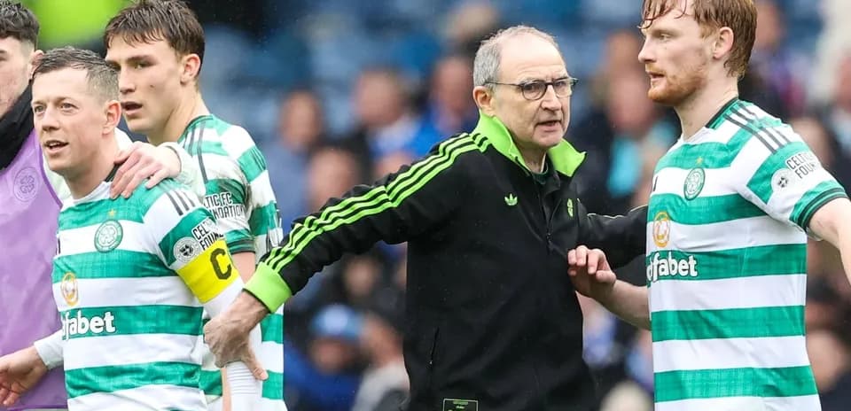 Celtic players and manager interacting during match
