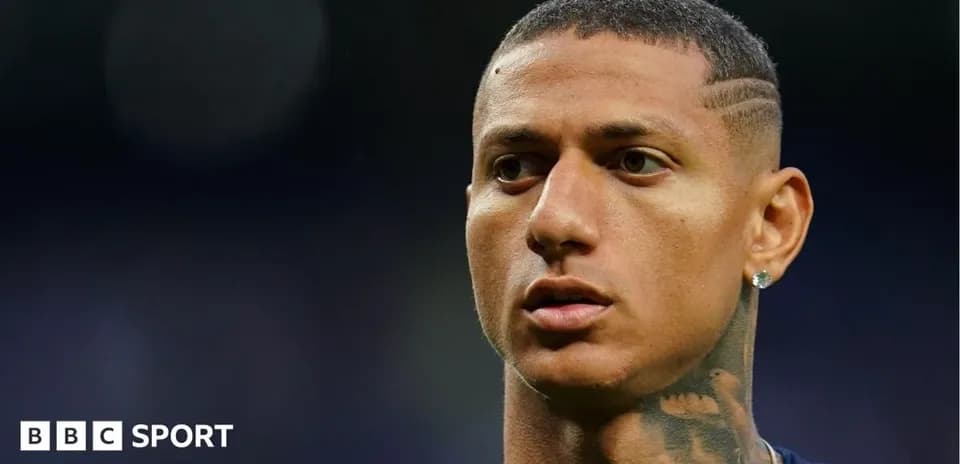 Football player with short hair and tattoos