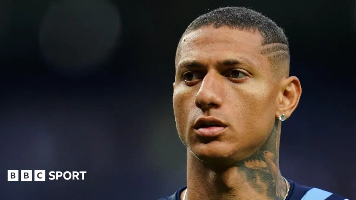 Football player with short hair and tattoos