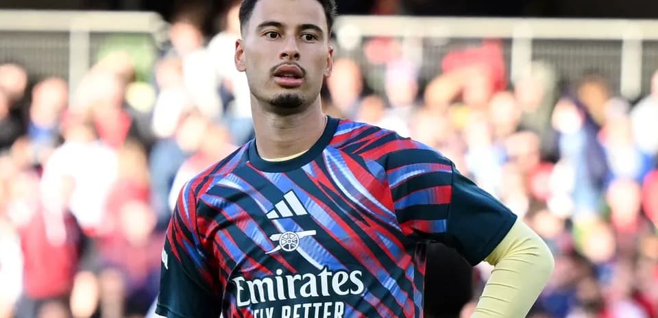 Goalkeeper warming up in colorful training kit