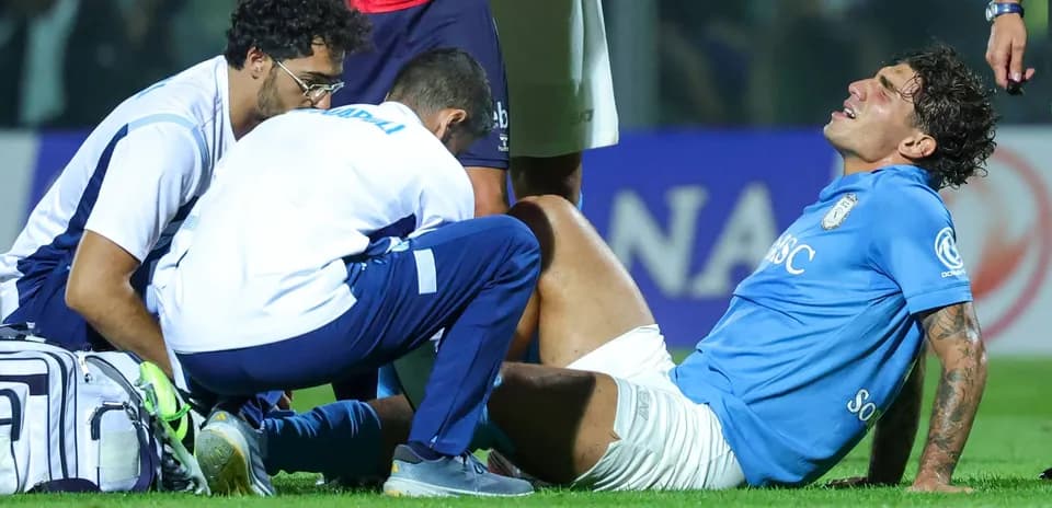 Player receiving medical attention for injury on field