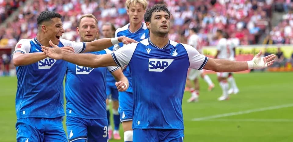Hoffenheim players celebrating a goal on the pitch