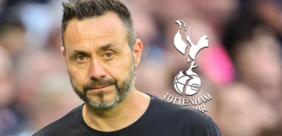 Coach with Tottenham Hotspur logo in background
