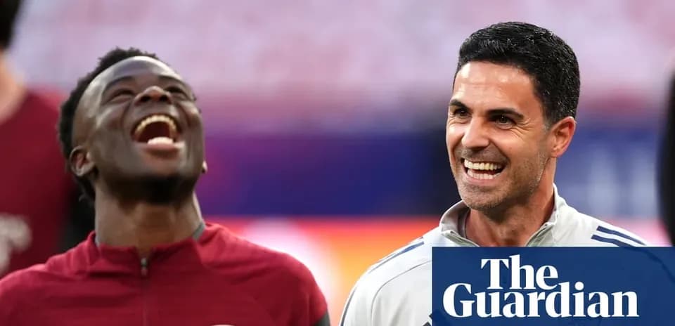 Arsenal players smiling during warm-up session