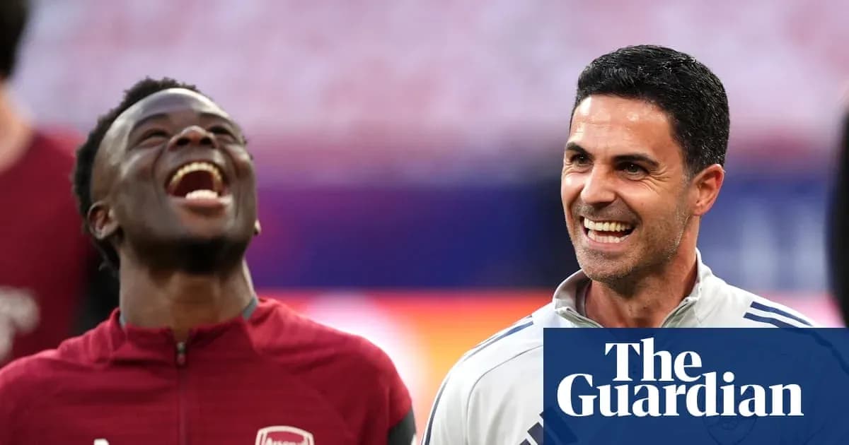 Arsenal players smiling during warm-up session