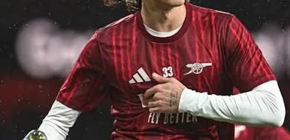 Player stretching during warm-up at match