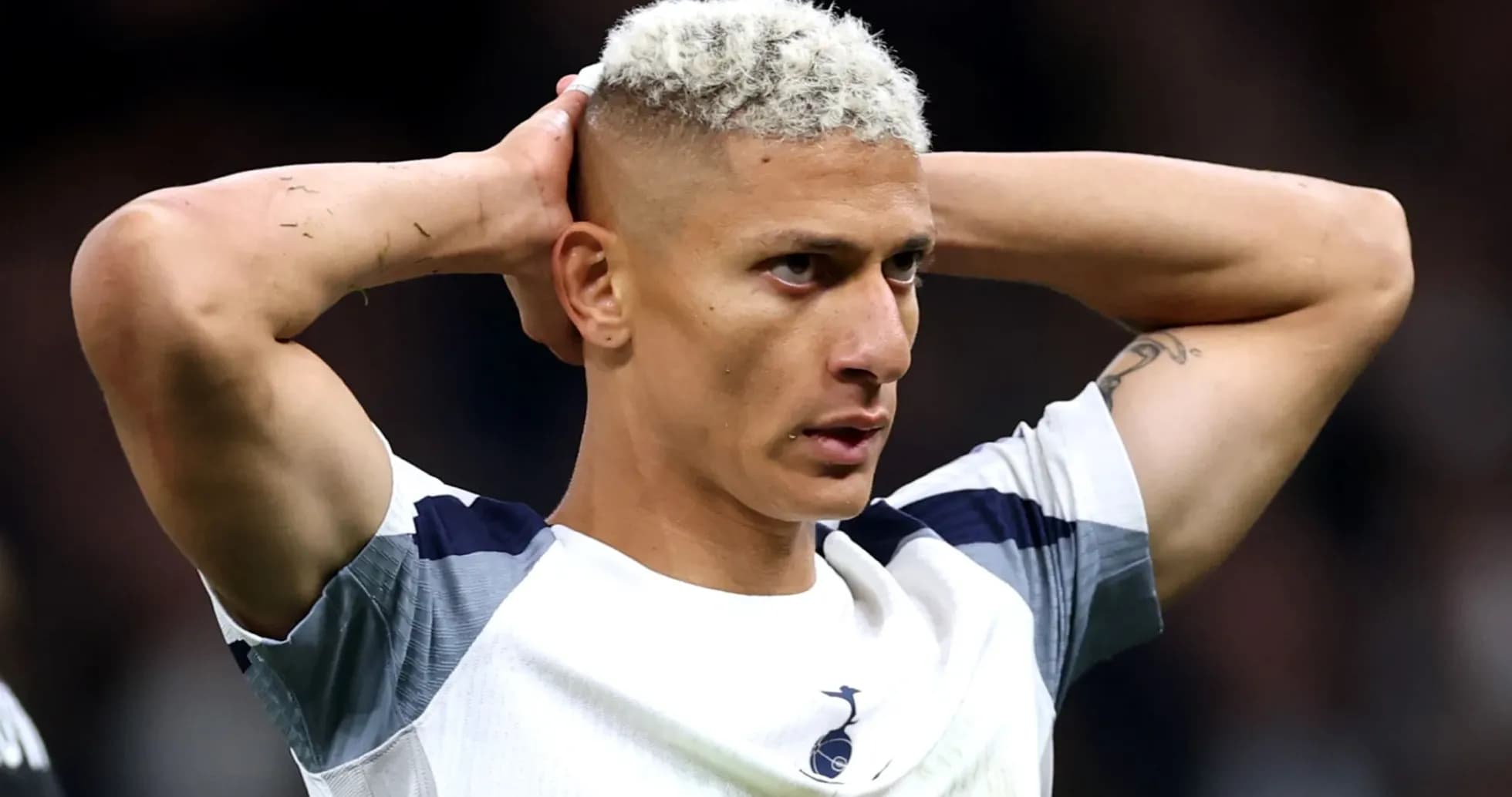 Player holding head during match moment