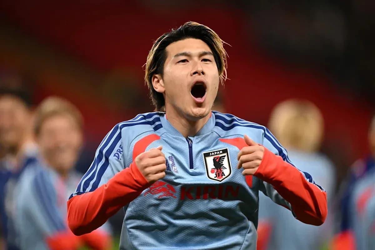Player celebrating during pre-match warm-up for Japan