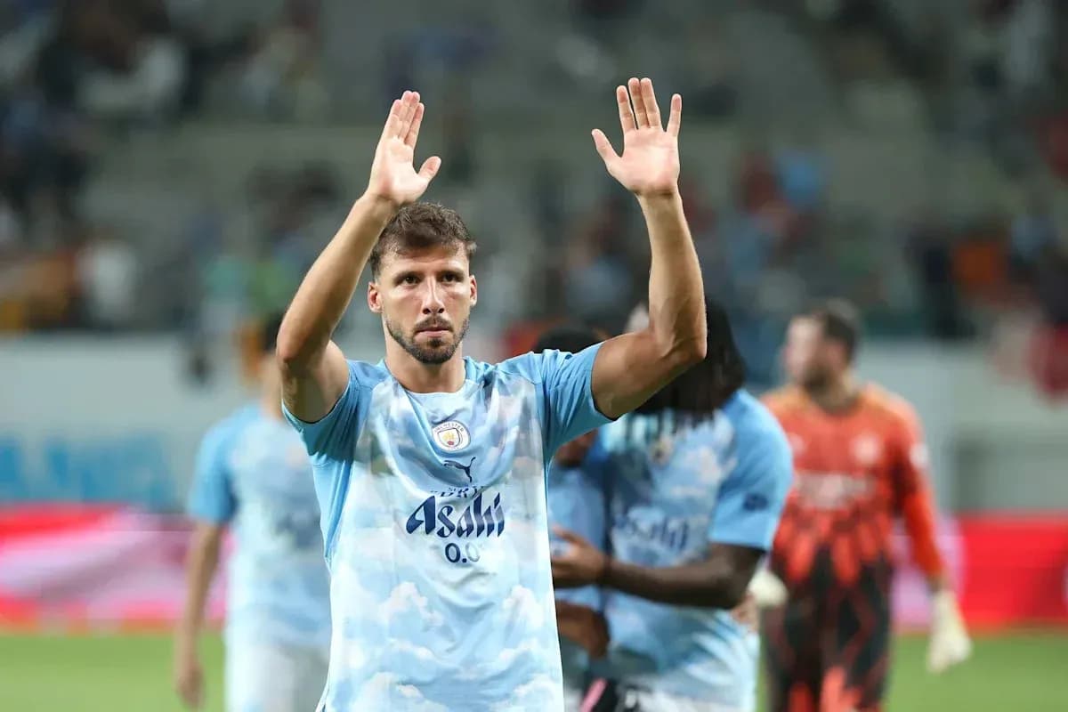 Player waving to fans after the match
