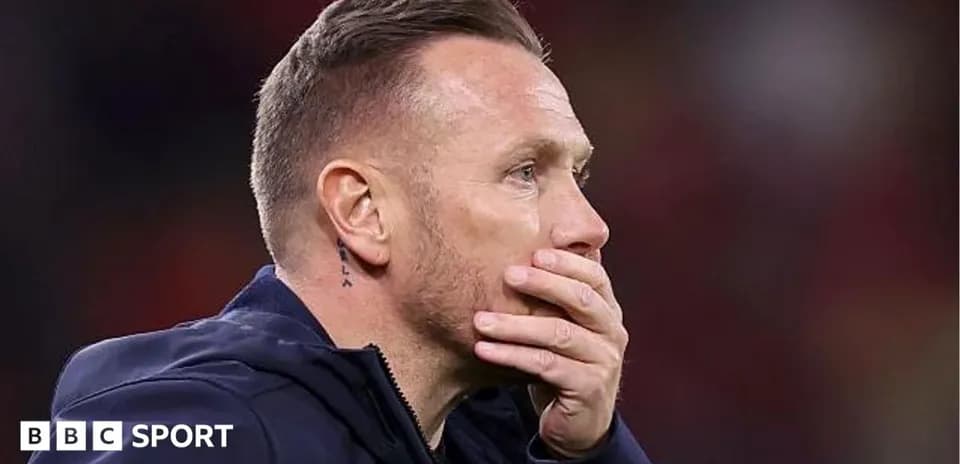Coach looking concerned during a match
