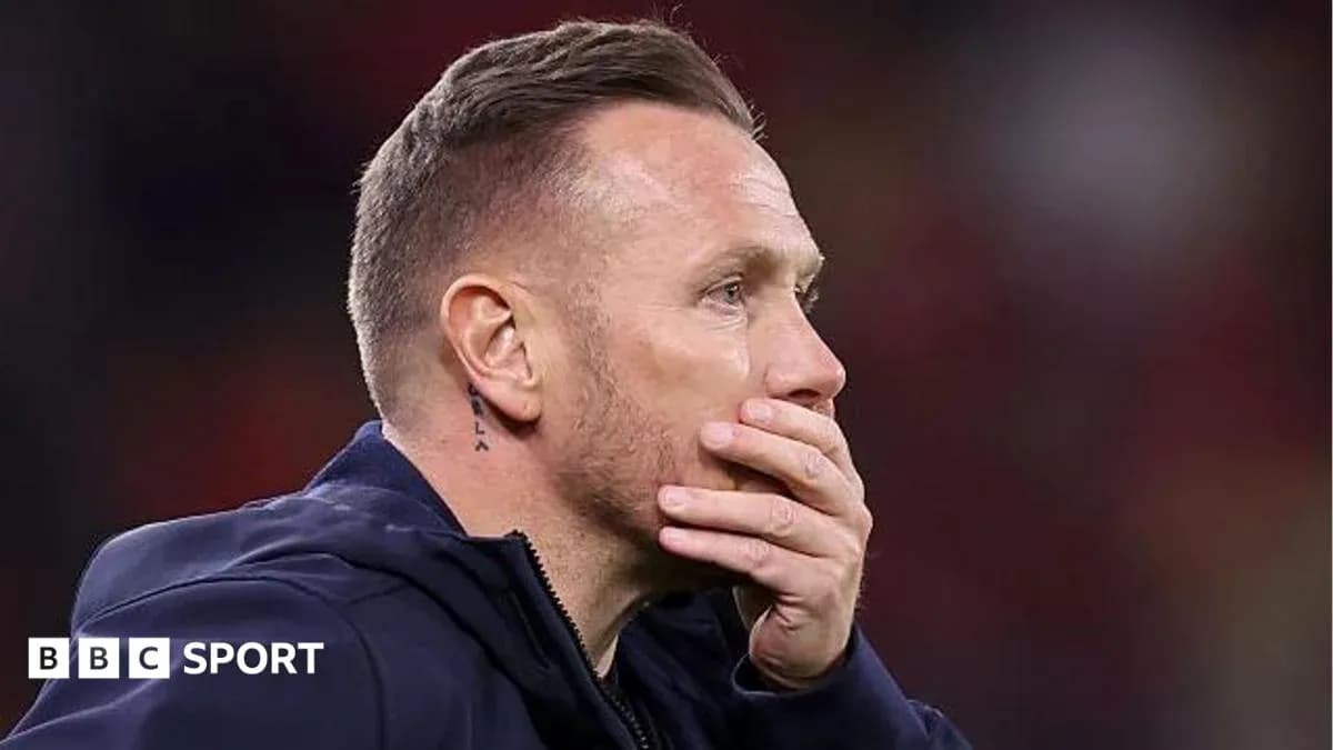 Coach looking concerned during a match