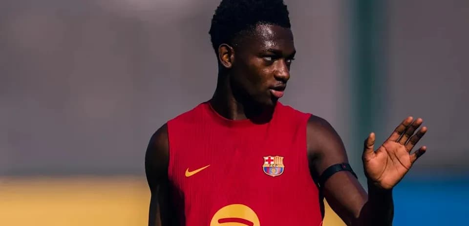 Player in red training jersey during practice session
